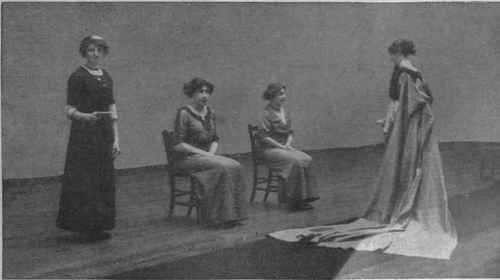 Debutantes, clad in their finery curtsey to King George V and Queen Mary  during a court presentation. Thus they are launched into  "Society". Date: 1928 - SuperStock